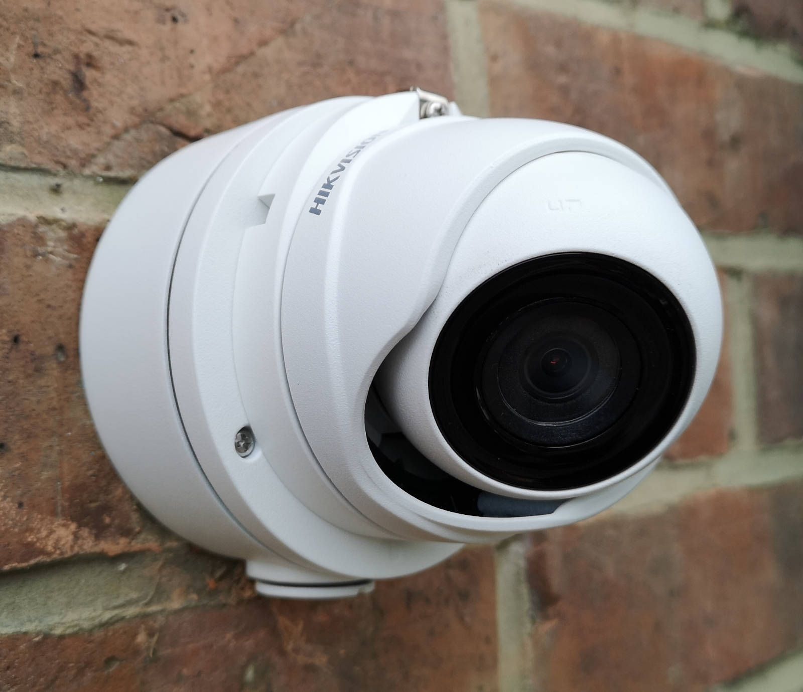 CCTV engineer installing a security camera